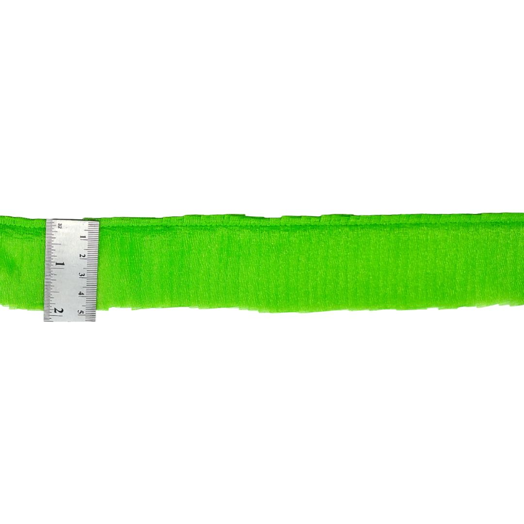 Green ribbon with a ruler on a white background