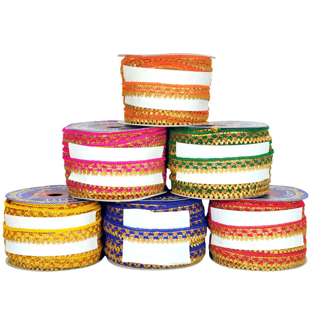 Set of colorful ribbons on spools with a white background