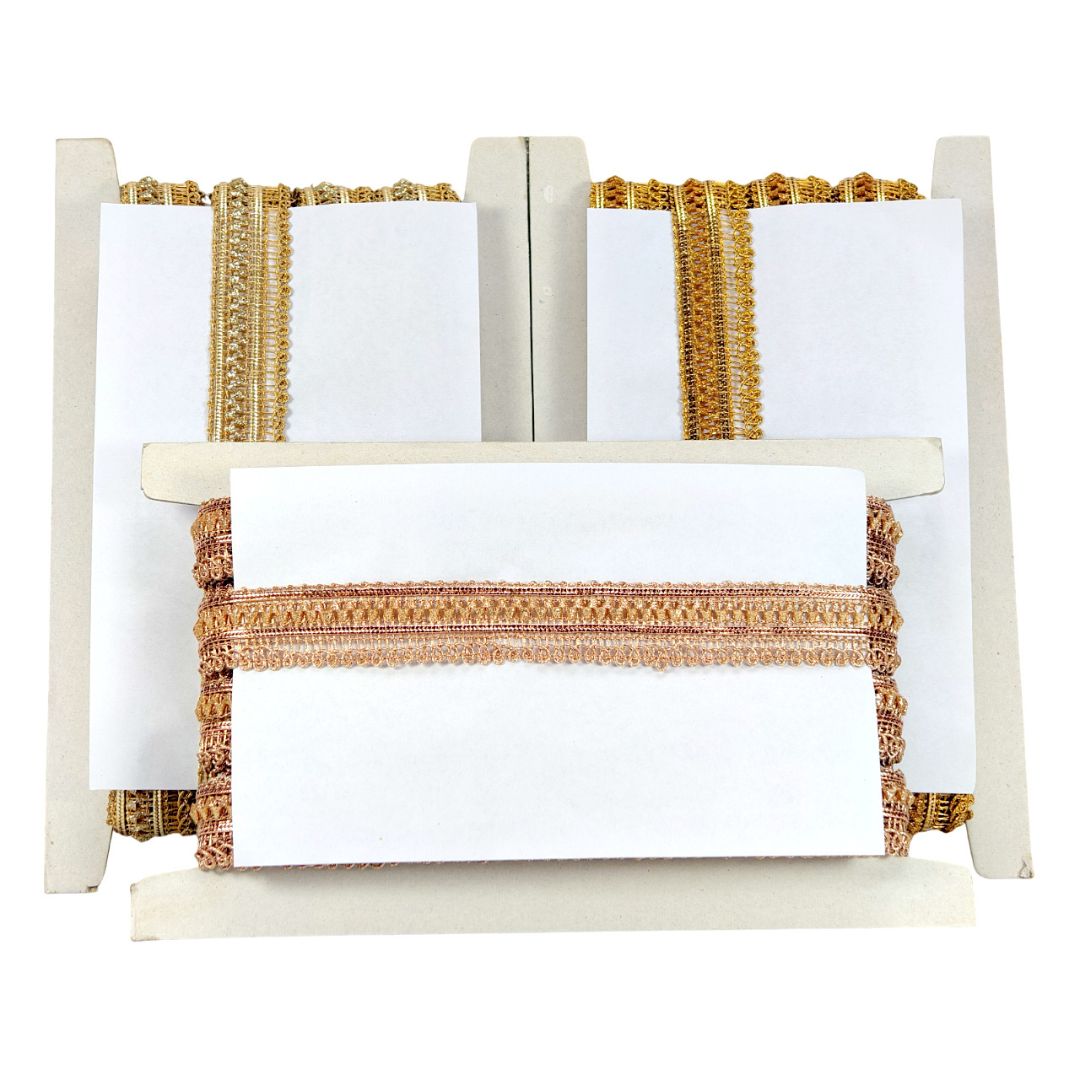 White paper with gold and beige ribbons on a white background