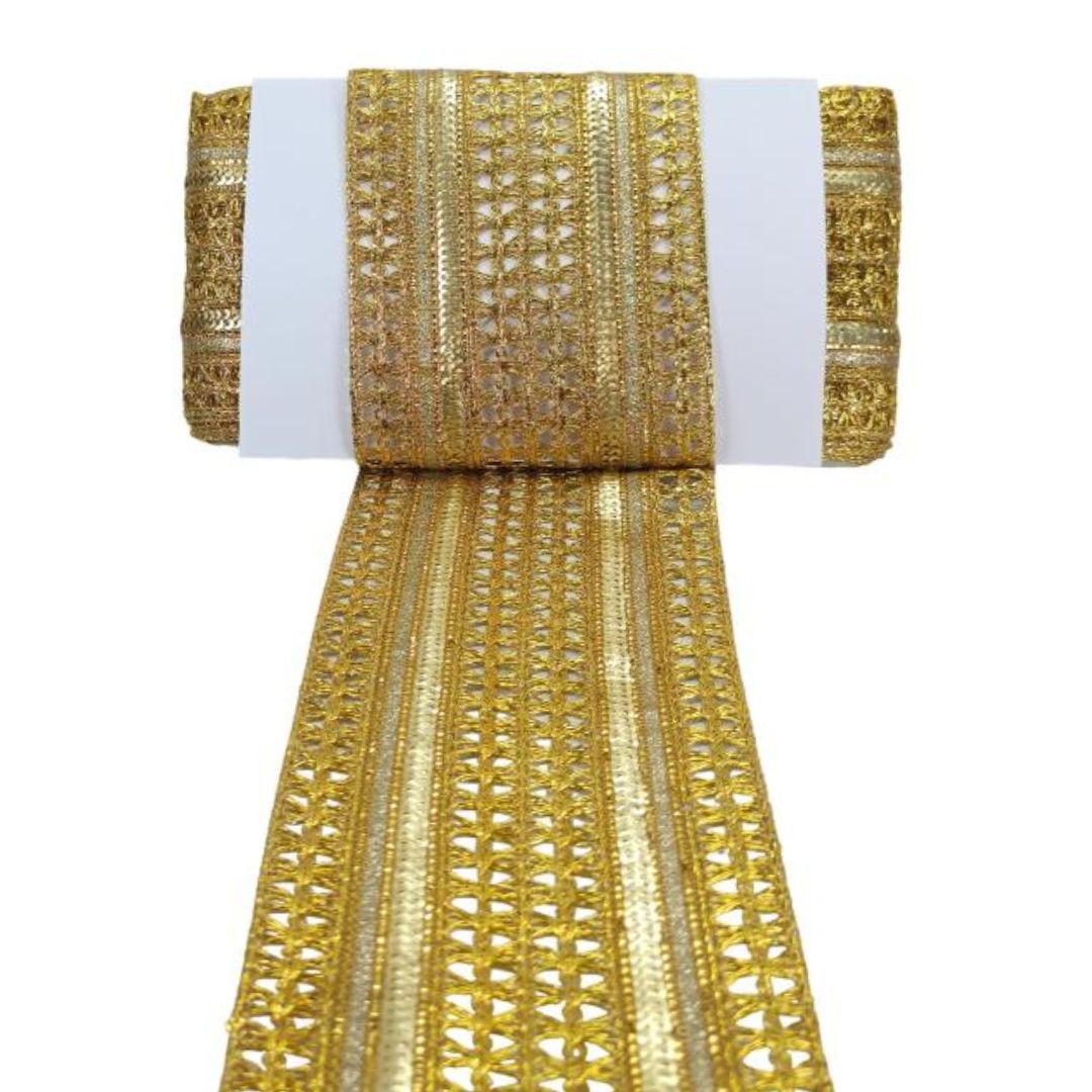 Gold lace ribbon on a white background