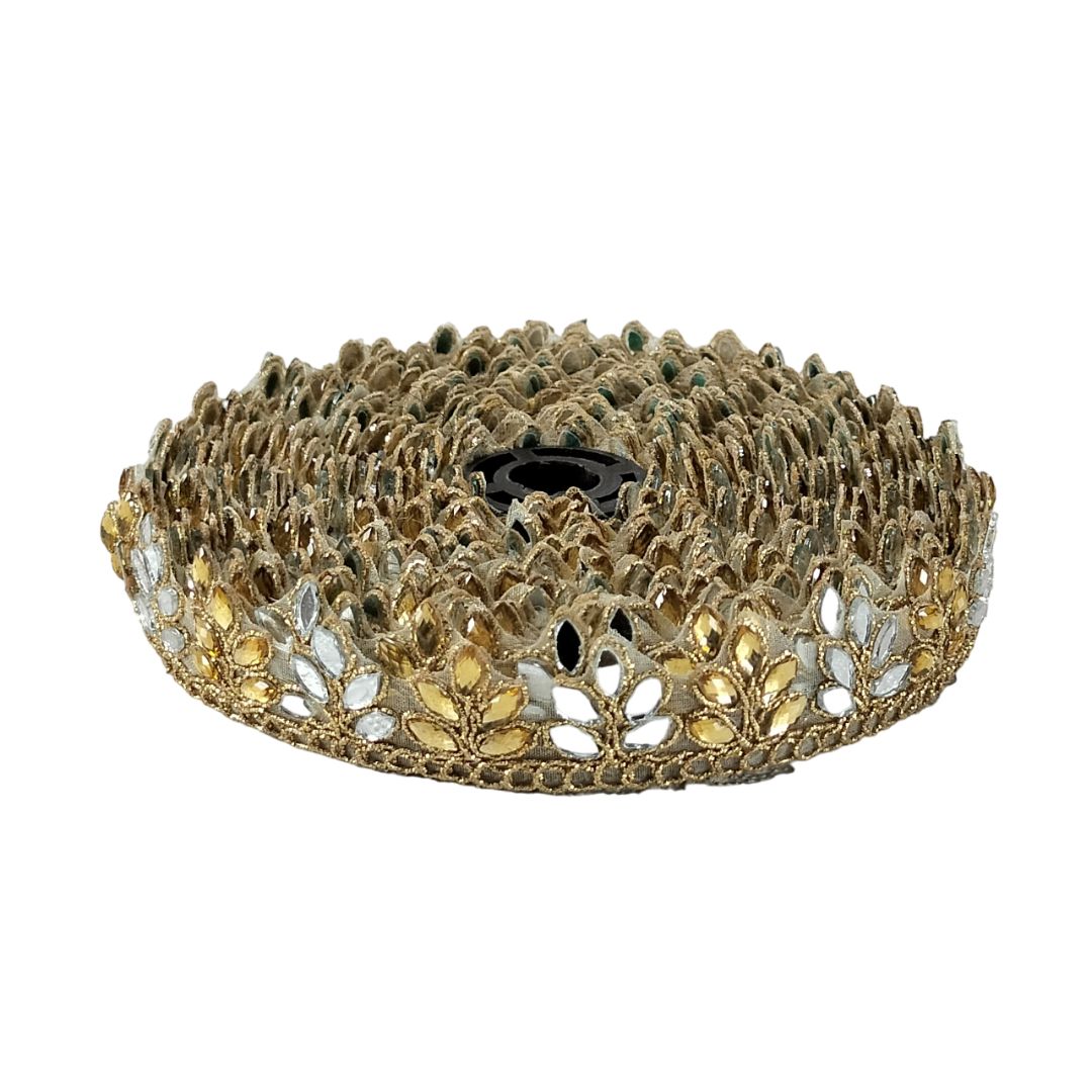 Gold and silver decorative headband on a white background