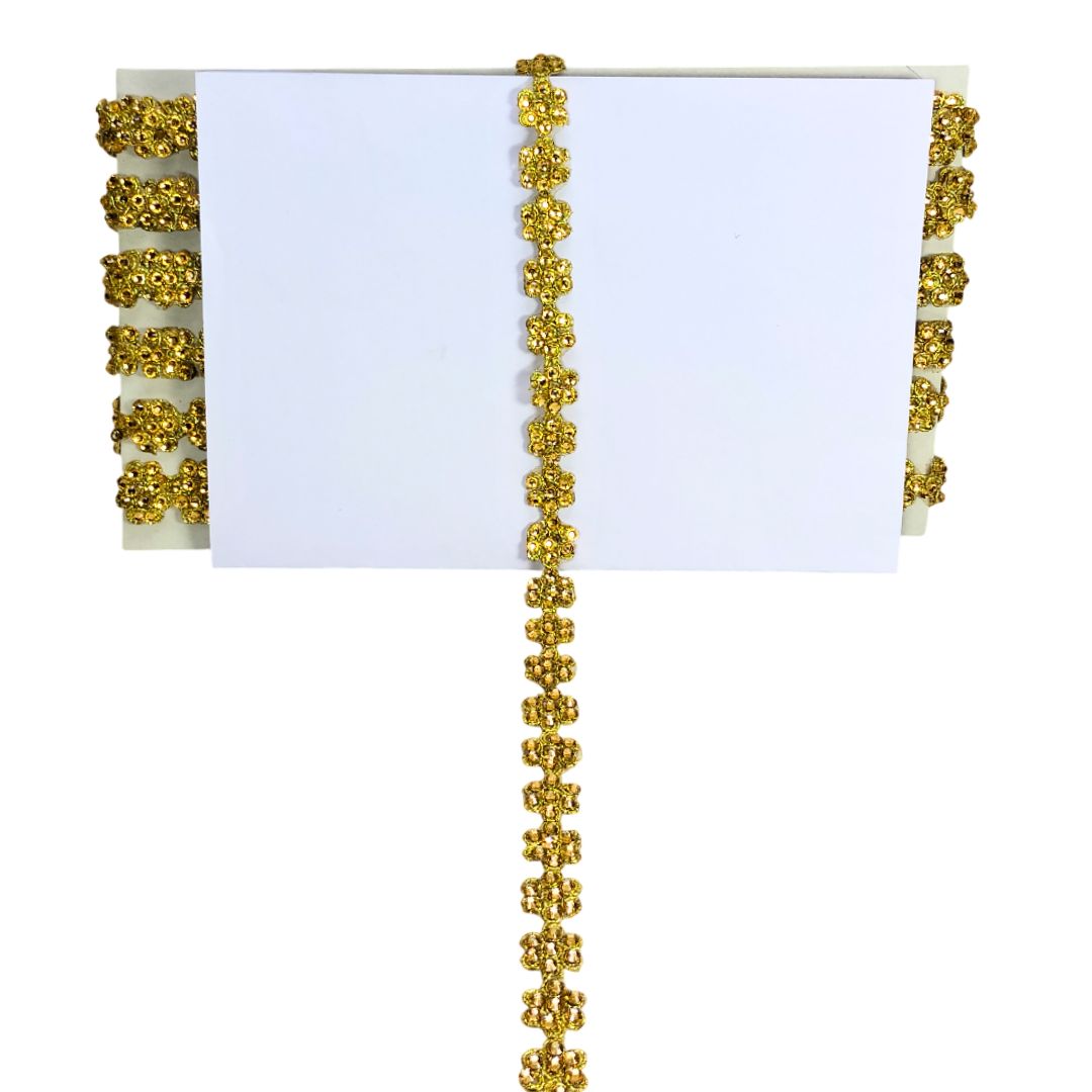 Gold decorative trim on a white background