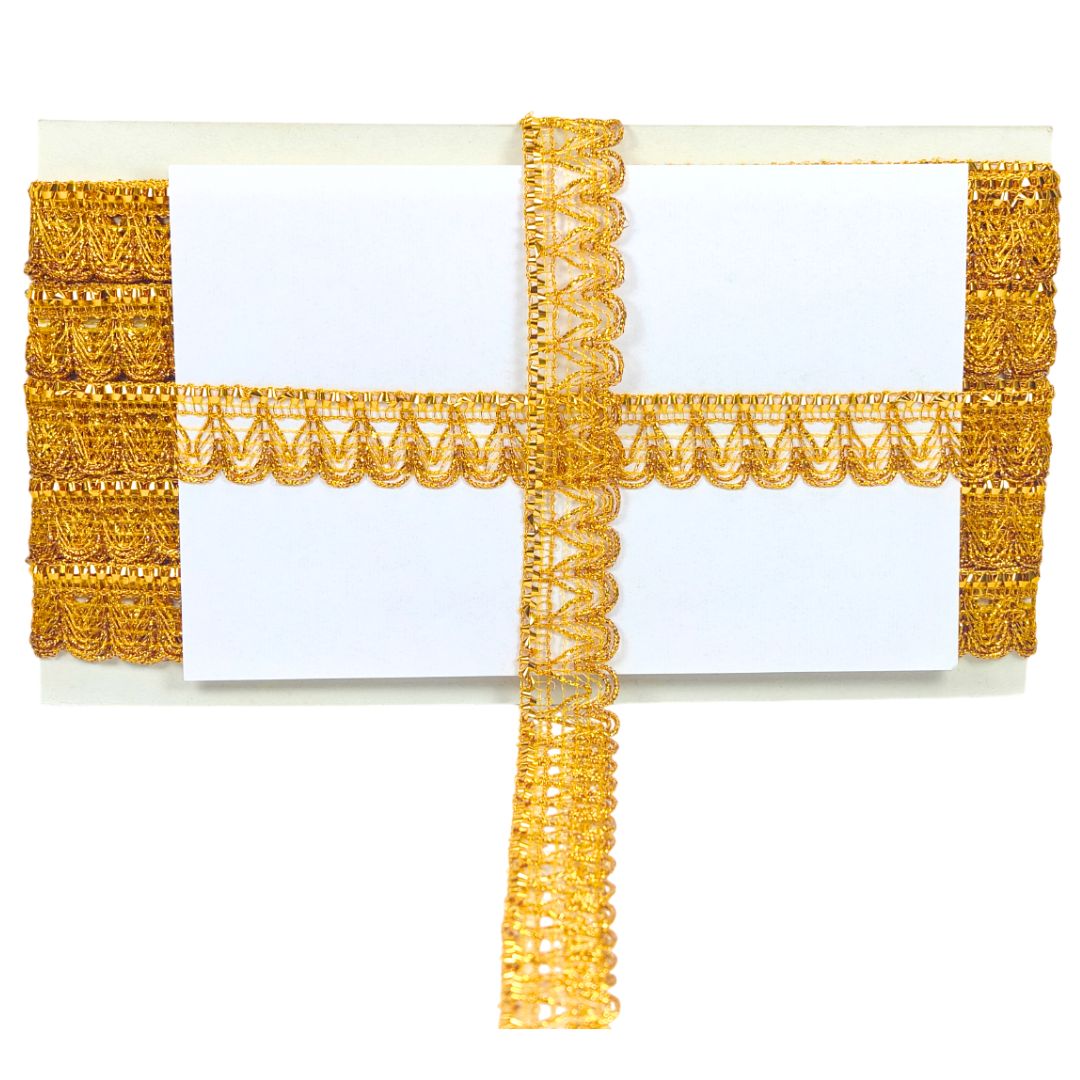 Gold lace ribbon on a white background