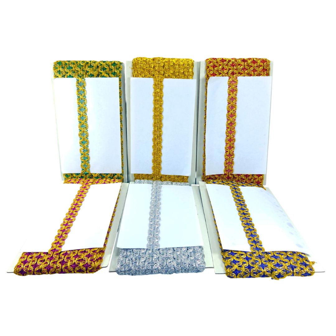 Set of four colorful fabric-bound notebooks on a white background