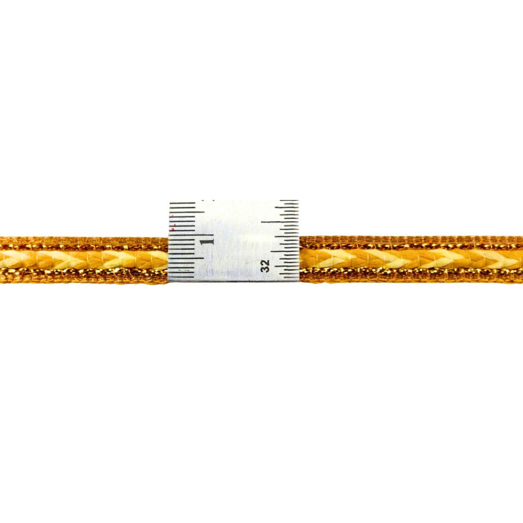 Gold-colored pencil with a ruler on a white background