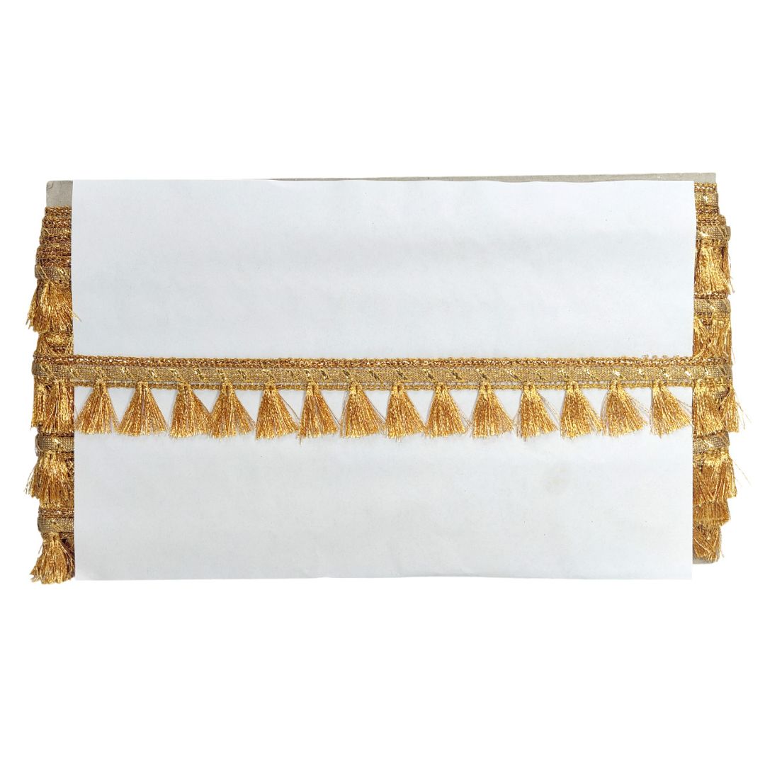 White clutch with gold tassel detailing on a white background