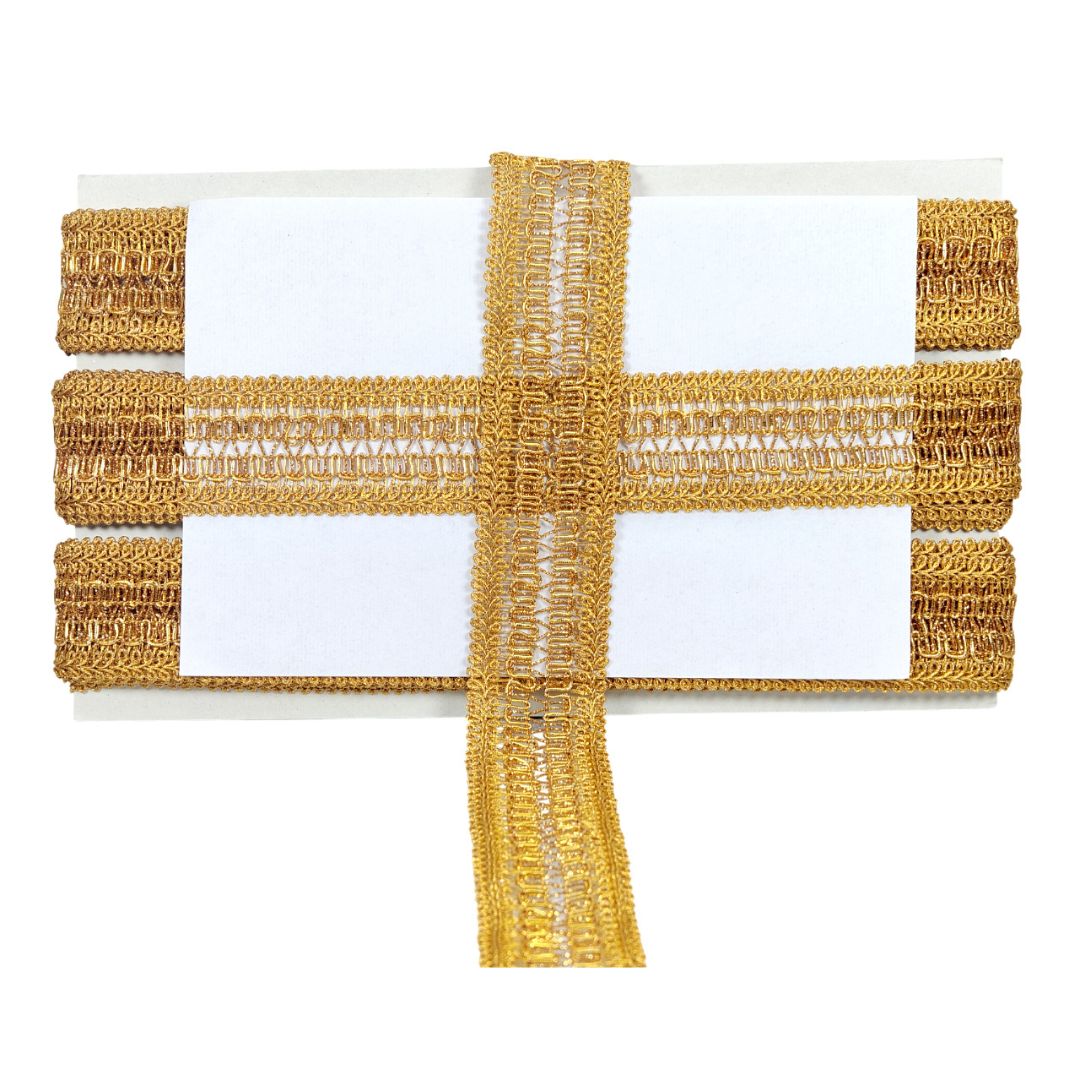 Decorative item with gold mesh and white center on a white background