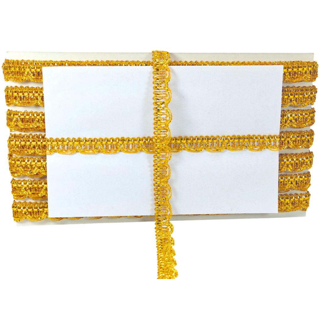 Gold beaded clutch bag on a white background