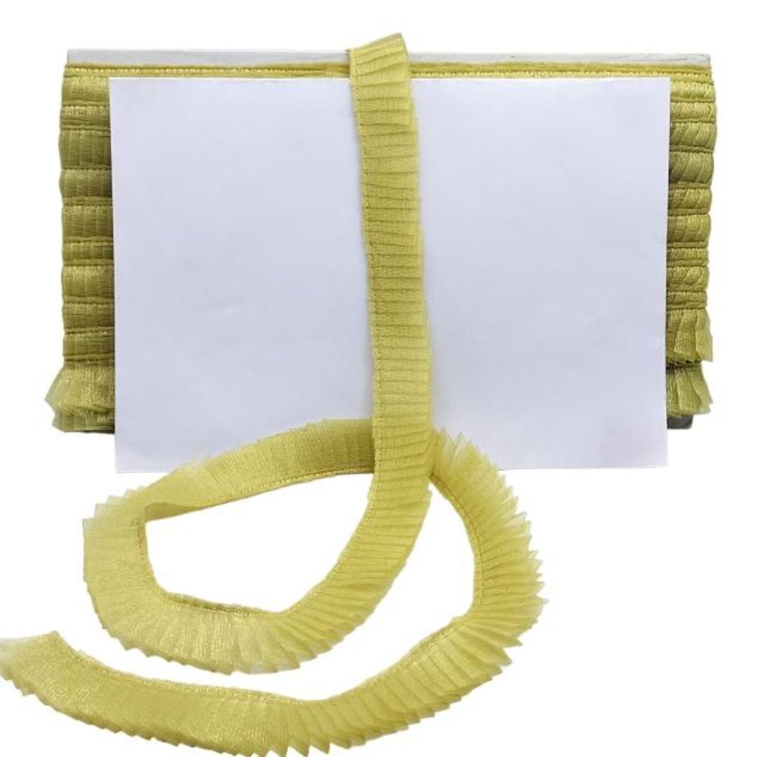 Yellow ribbed belt with a white card on a white background