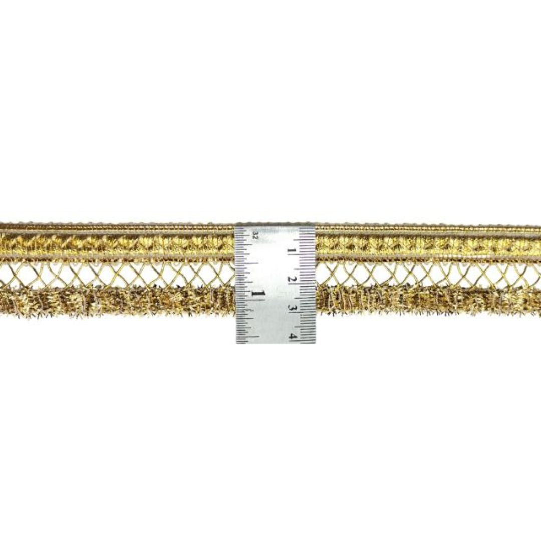 Gold metallic trim with a ruler for measurement on a white background
