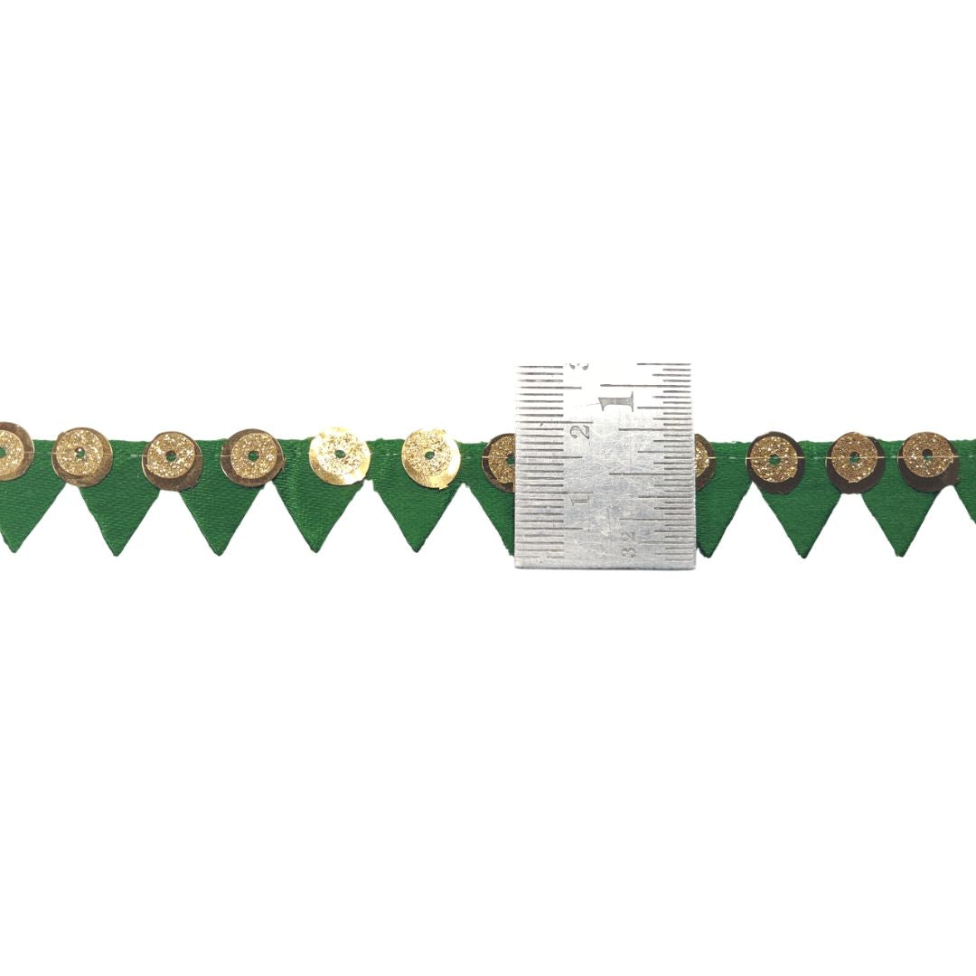 Decorative border with green triangles and gold coins on a white background