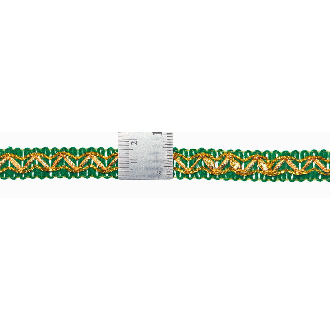 Green and gold braided ribbon with a measuring tape on a white background