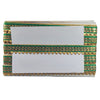 Decorative clutch with green and gold patterns on a white background