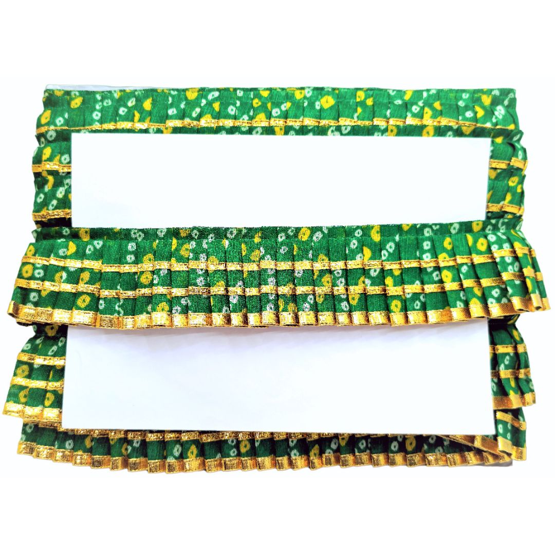 Green and yellow patterned fabric ruffled valance on a white background
