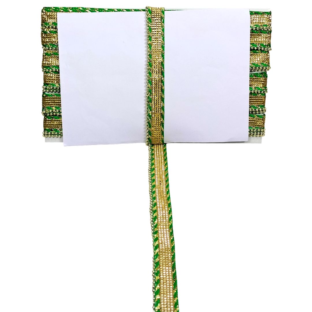 White card with green and gold decorative ribbons on a white background
