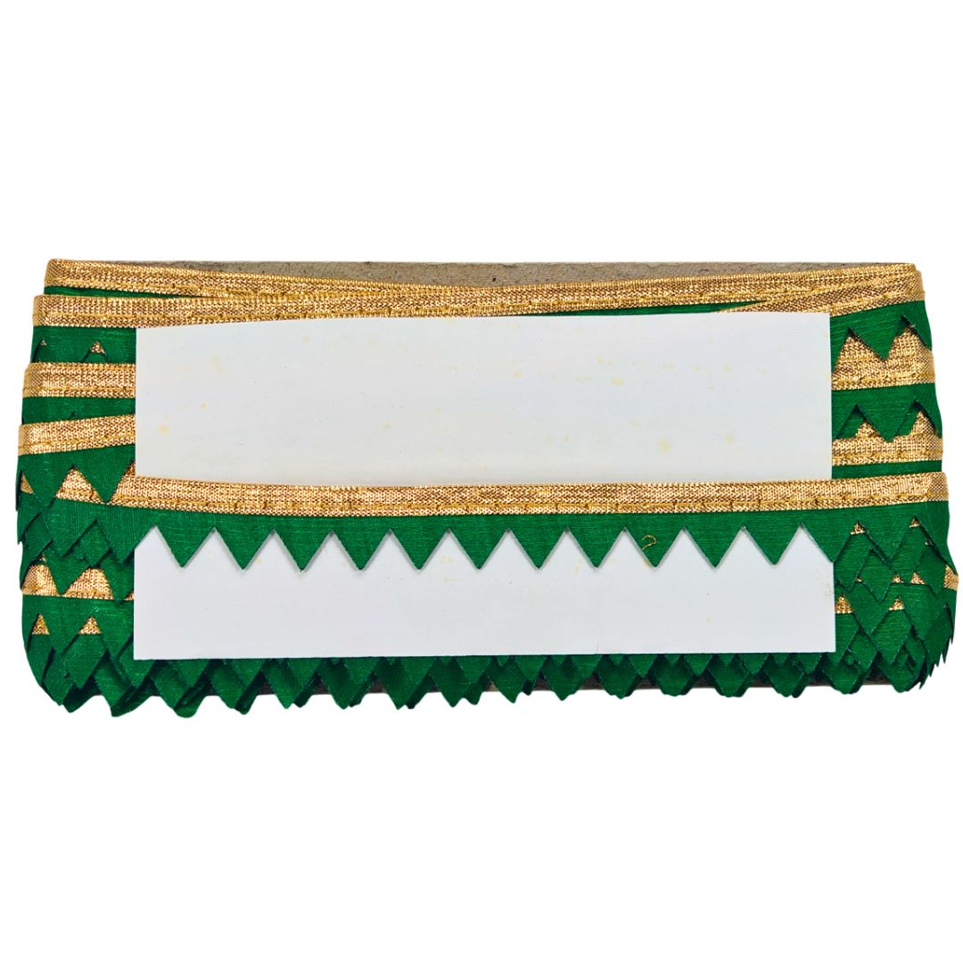 Decorative green and gold card holder with a white card inside on a white background