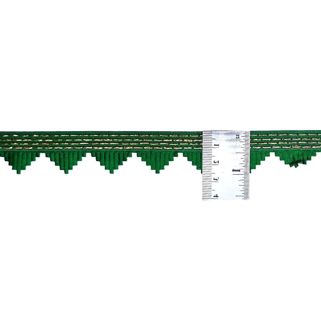 Green wooden ruler with measurement scale on a white background