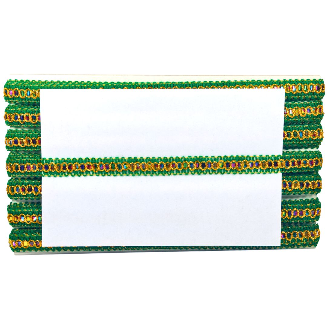 Decorative green and gold frame with a white center on a white background