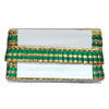 Decorative cornice with green and gold pattern on a white background