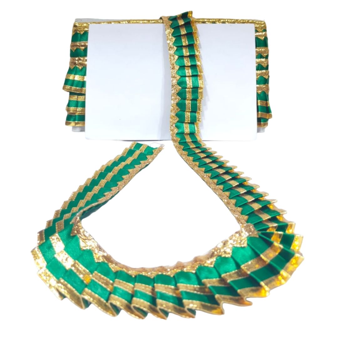 Green and gold embroidered blouse with matching sleeves on a white background