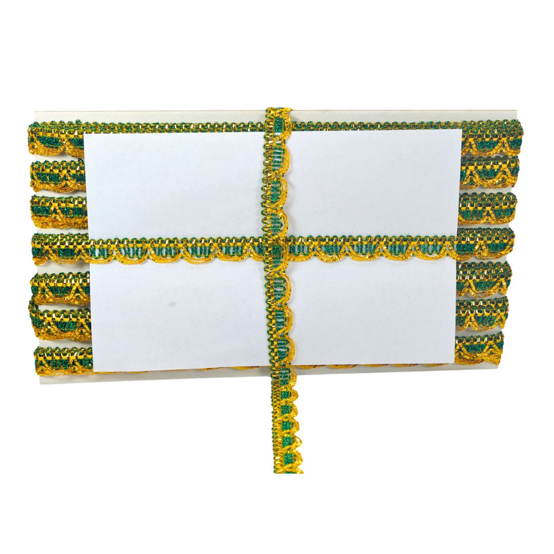 Decorative clutch with green and yellow pattern on a white background