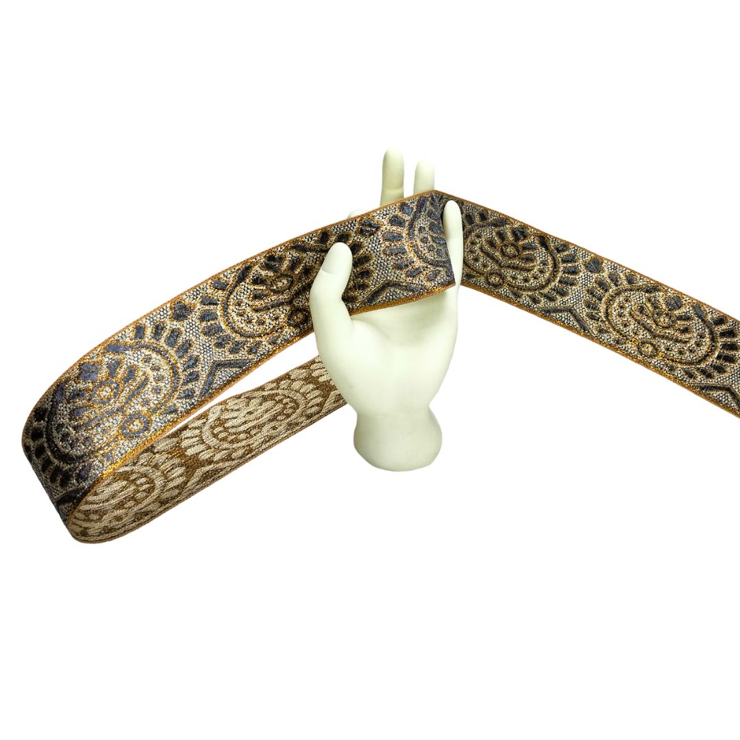 Decorative ribbon with paisley pattern on a white background