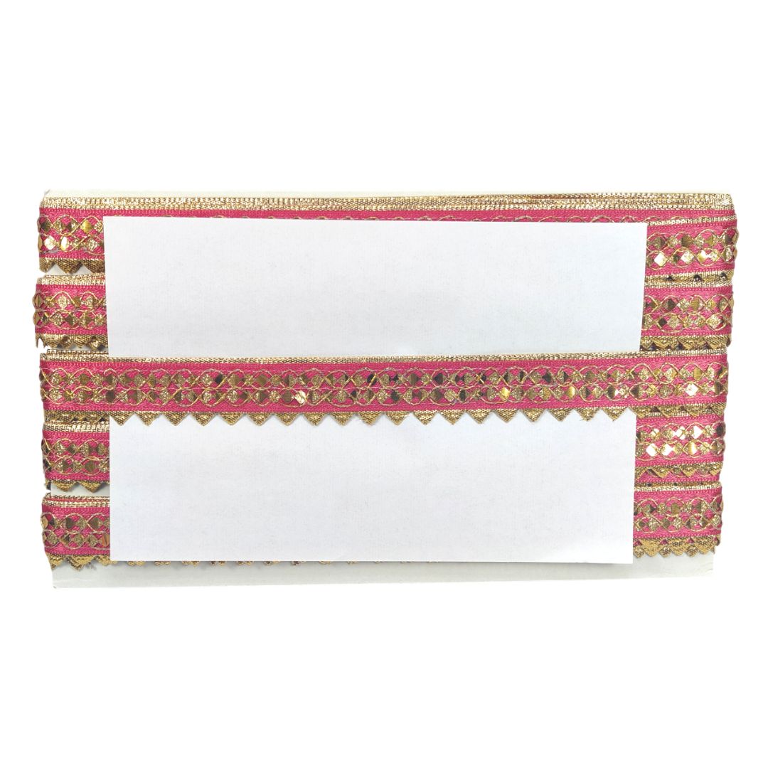Decorative clutch with pink and gold trim on a white background