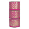 Three rolls of pink ribbon with gold patterns on a white background