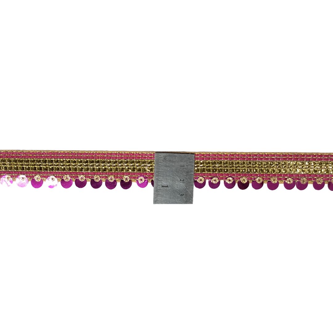 Decorative trim with gold and pink accents on a white background