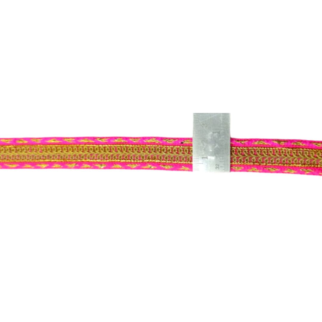 Pink and gold braided cord with a metal clip on a white background