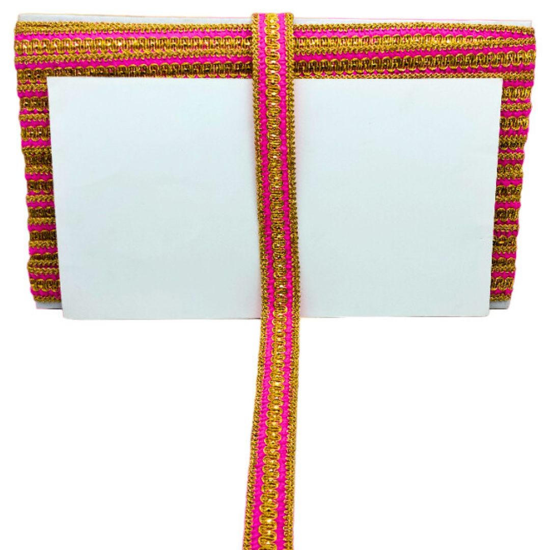 Decorative ribbon with pink and gold stripes on a white background