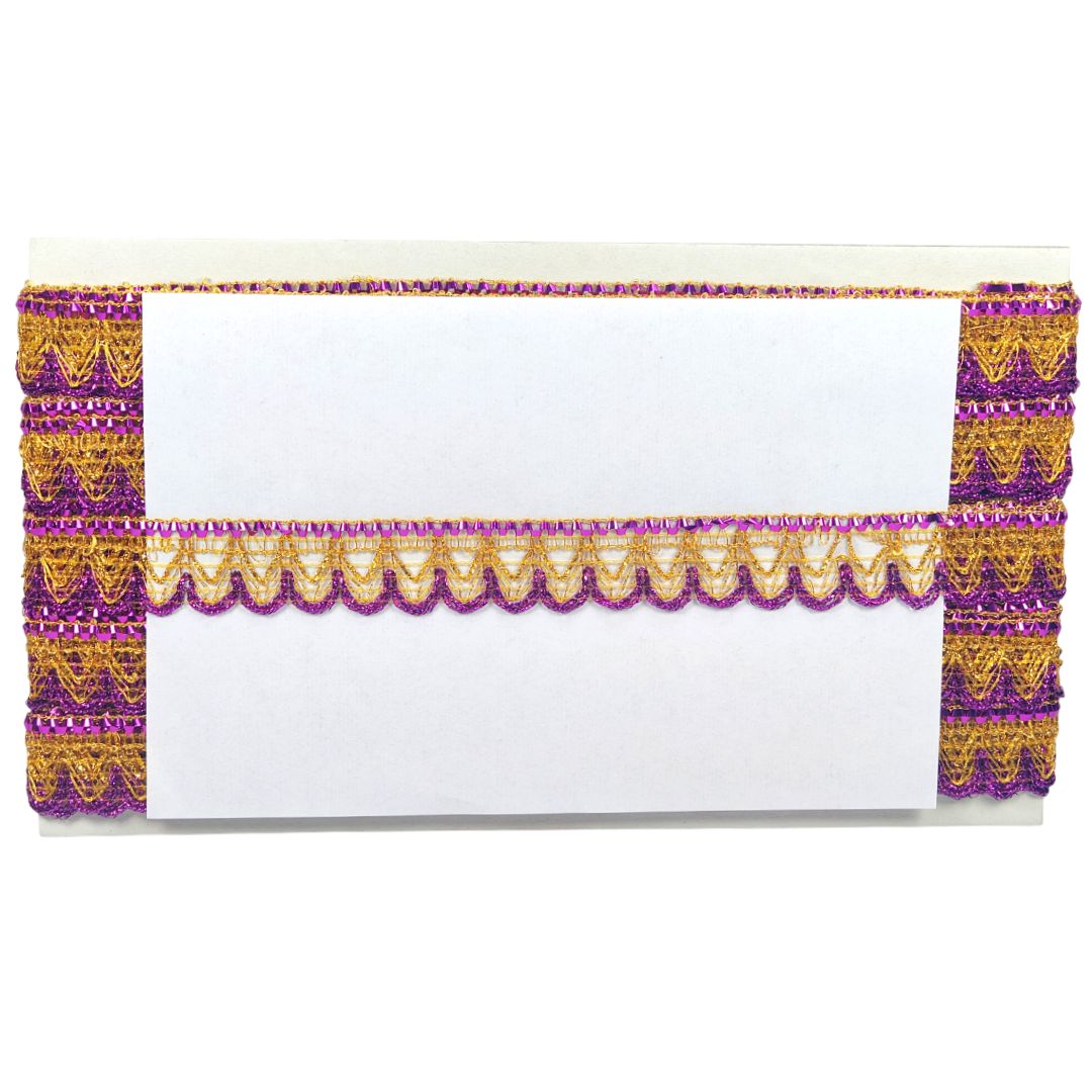 Decorative table runner with purple and gold lace on a white background