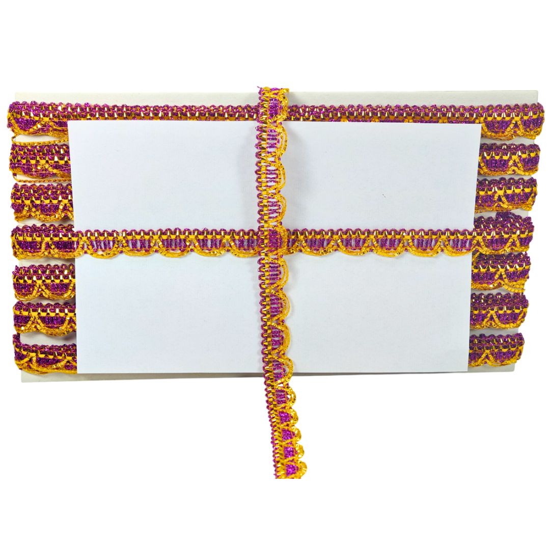 Decorative headband with pink and yellow patterns on a white background