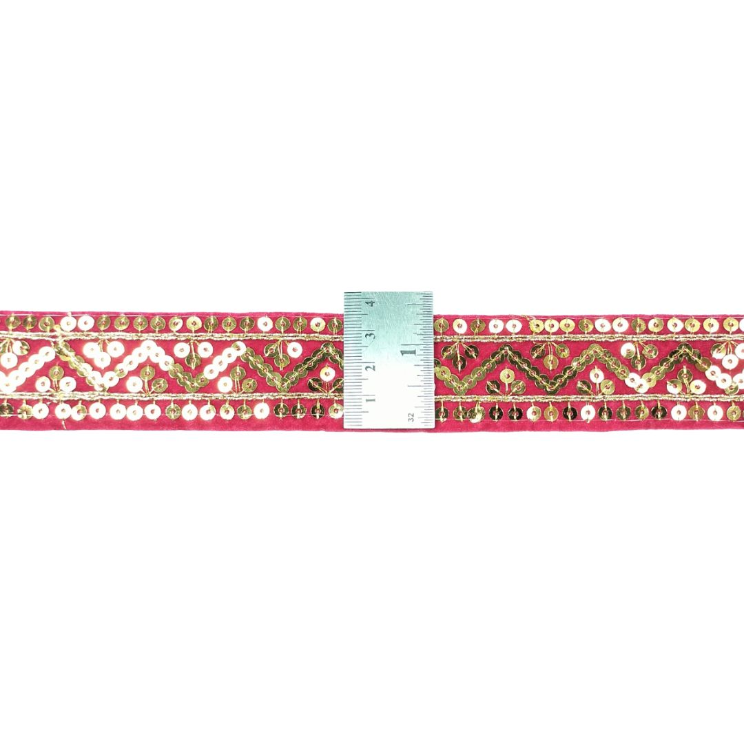 Decorative border strip with floral and geometric patterns on a white background