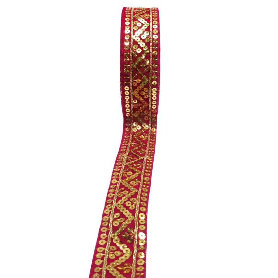 Decorative ribbon with gold pattern on a white background