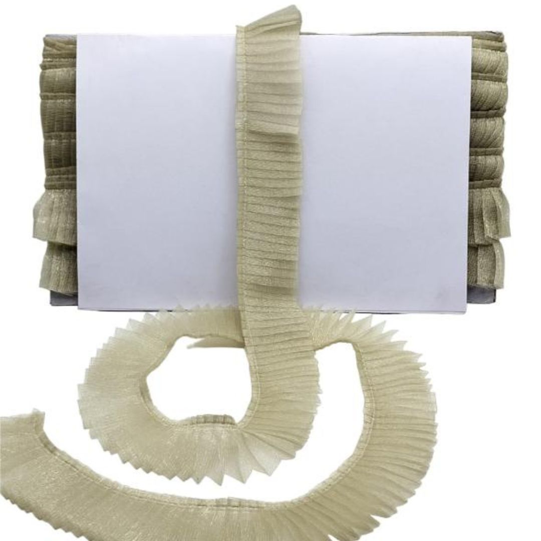 Beige ruffled trim on a white background