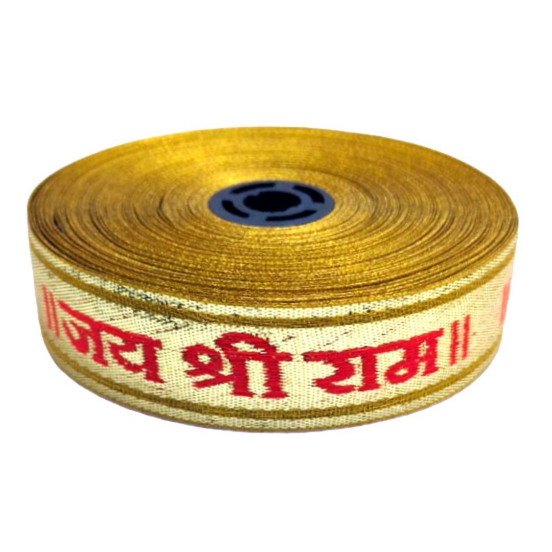 Roll of yellow fabric with red text on a white background
