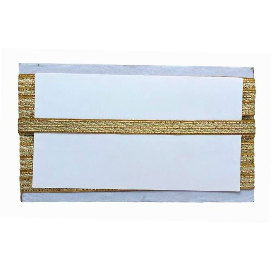 White clutch with gold woven strap on a white background