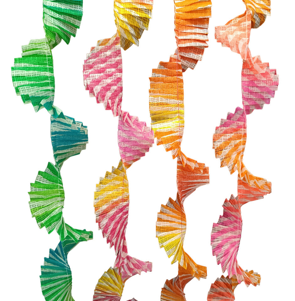 Colorful paper fan decorations on a white background