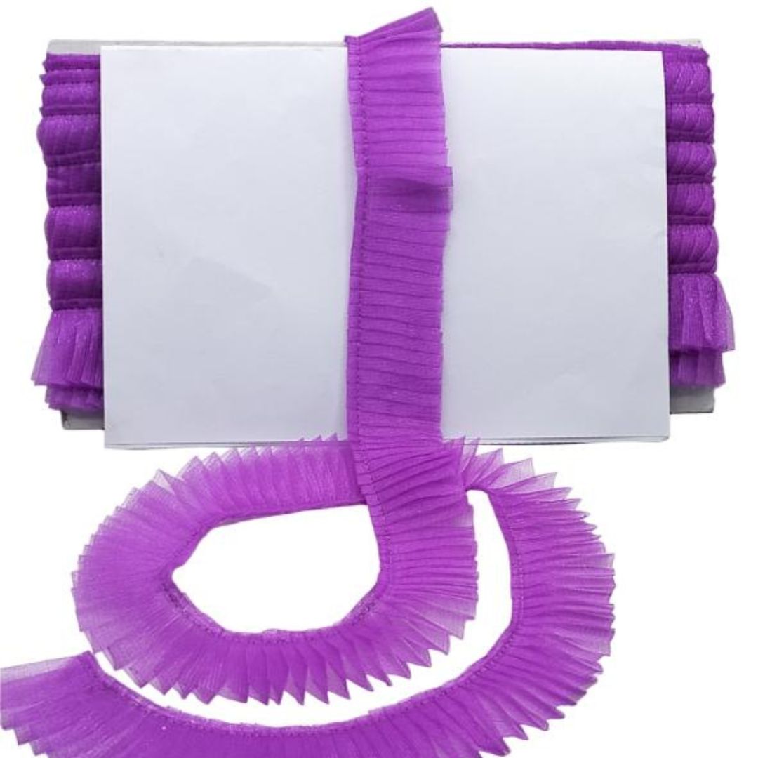 Purple pleated ribbon with a white background