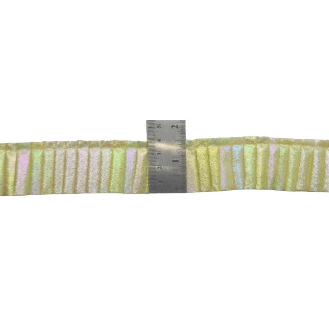 Striped ribbon with a ruler for scale on a white background