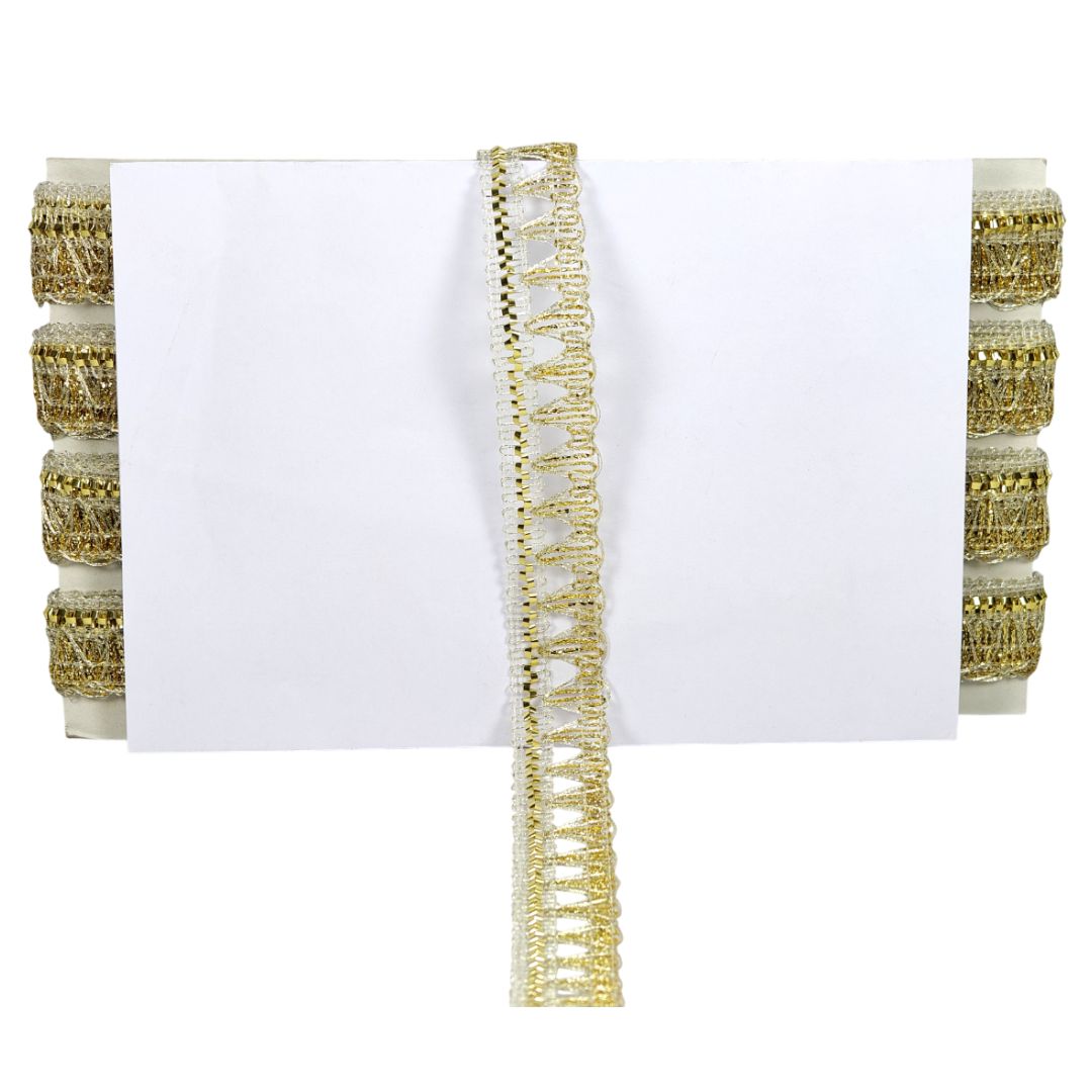 Gold decorative napkin rings on a white background