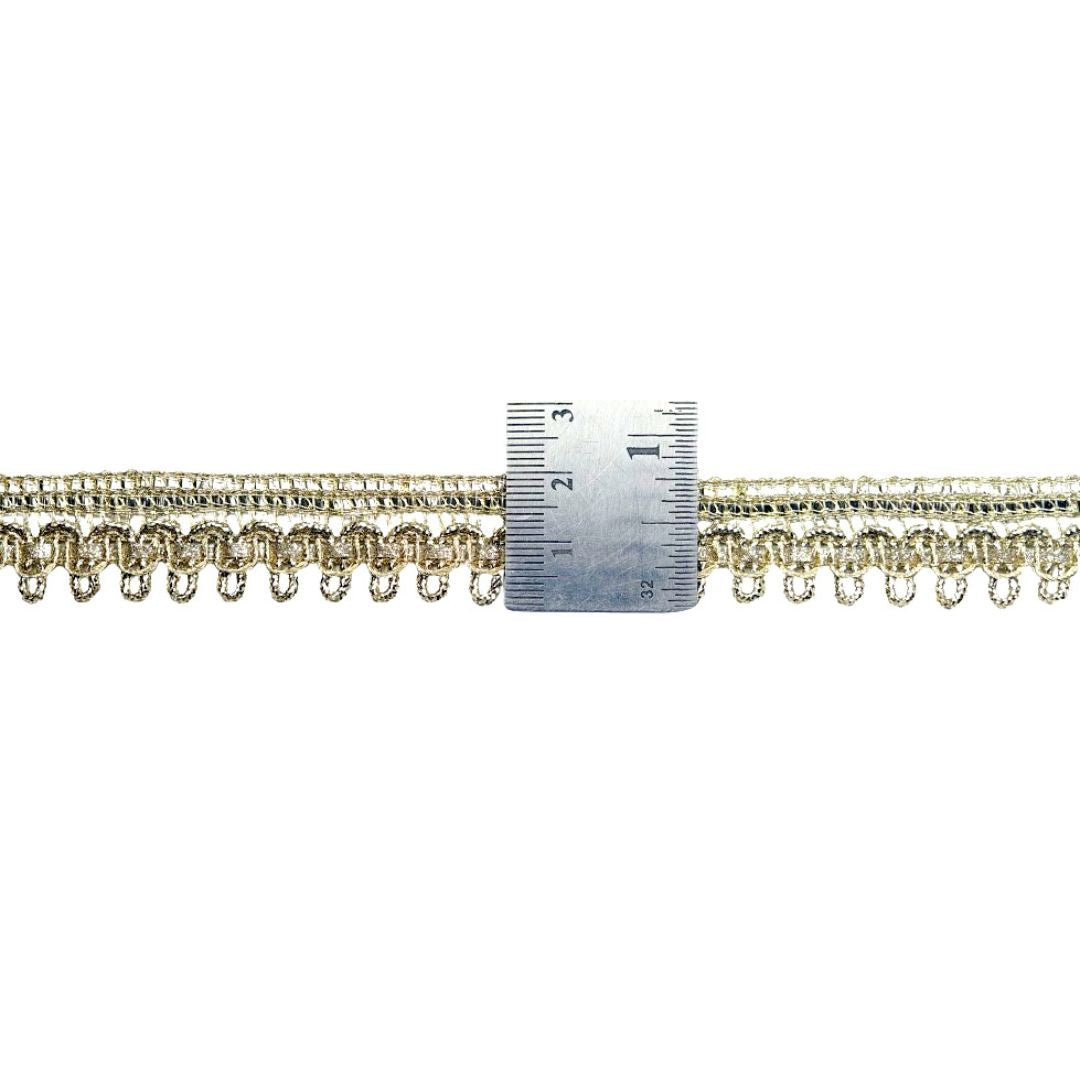 Gold chain with a ruler for measurement on a white background