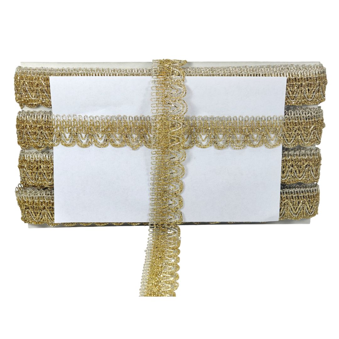 White clutch with gold lace detailing on a white background