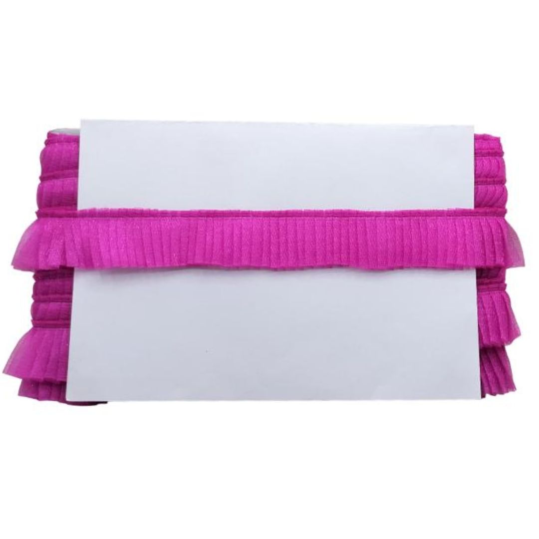 Pink ruffled trim on a white background