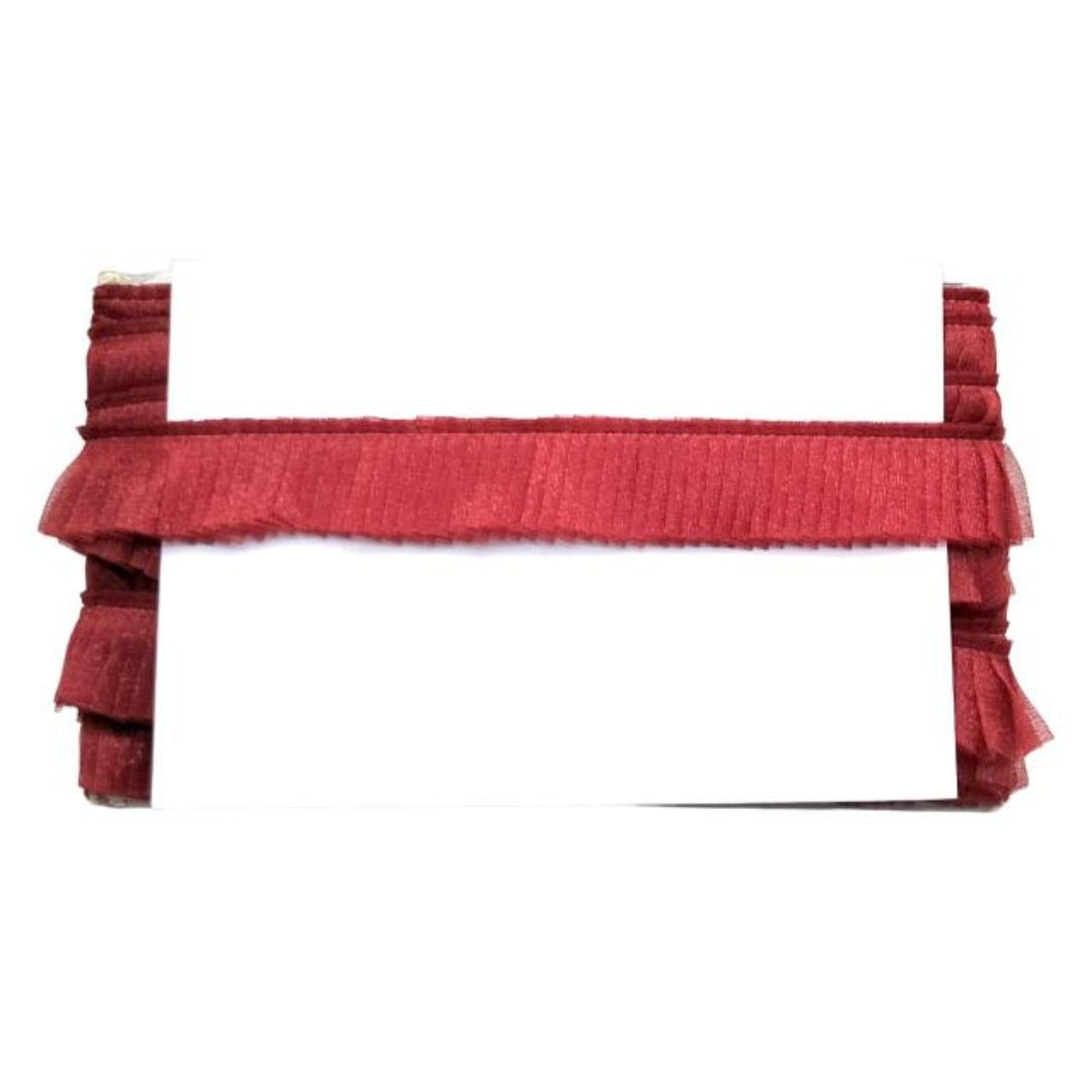 Red ruffled valance on a white background