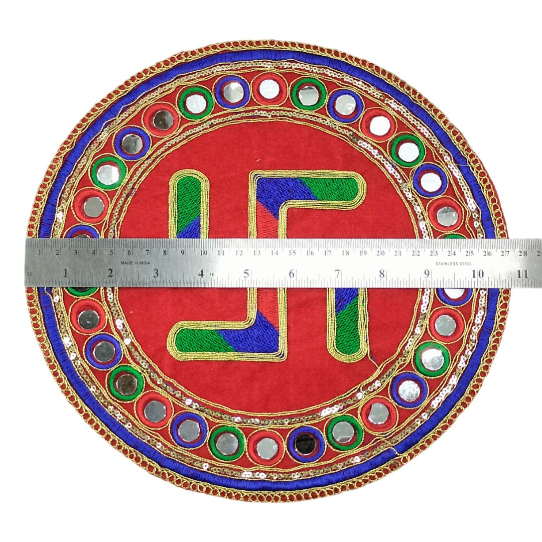 Decorative circular patch with colorful design and measurement ruler on a white background
