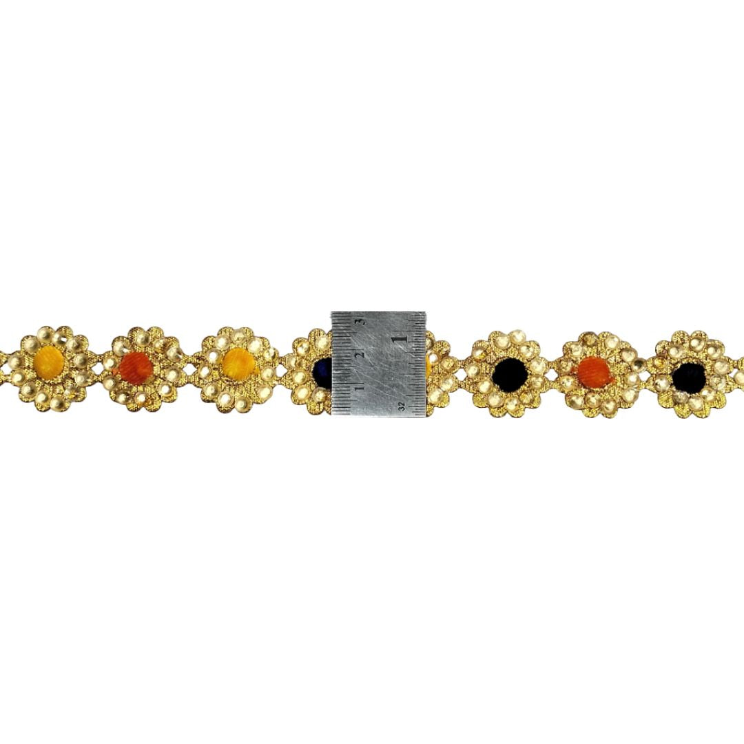 Gold bracelet with colorful stones on a white background