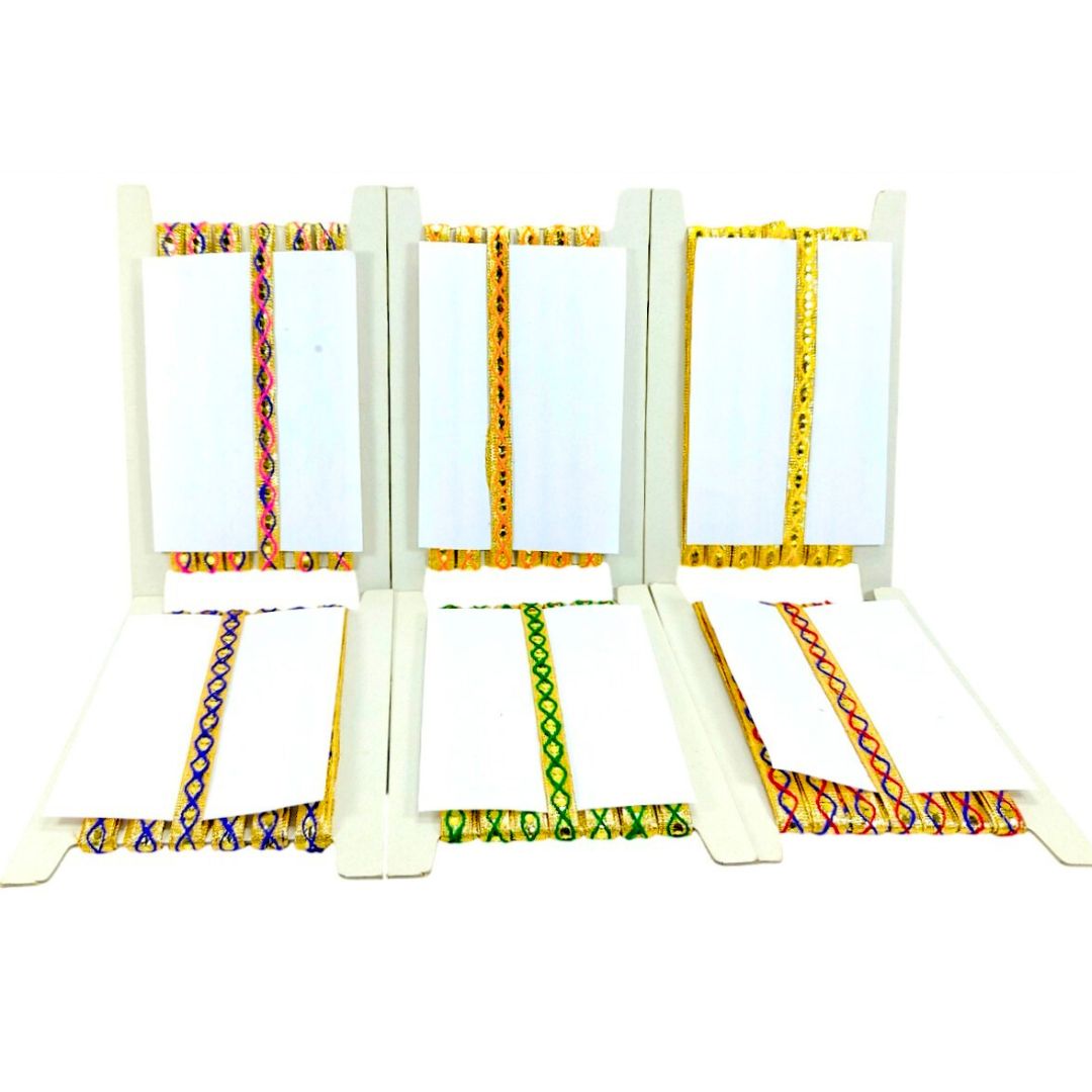 White pet gate with colorful fabric on a white background