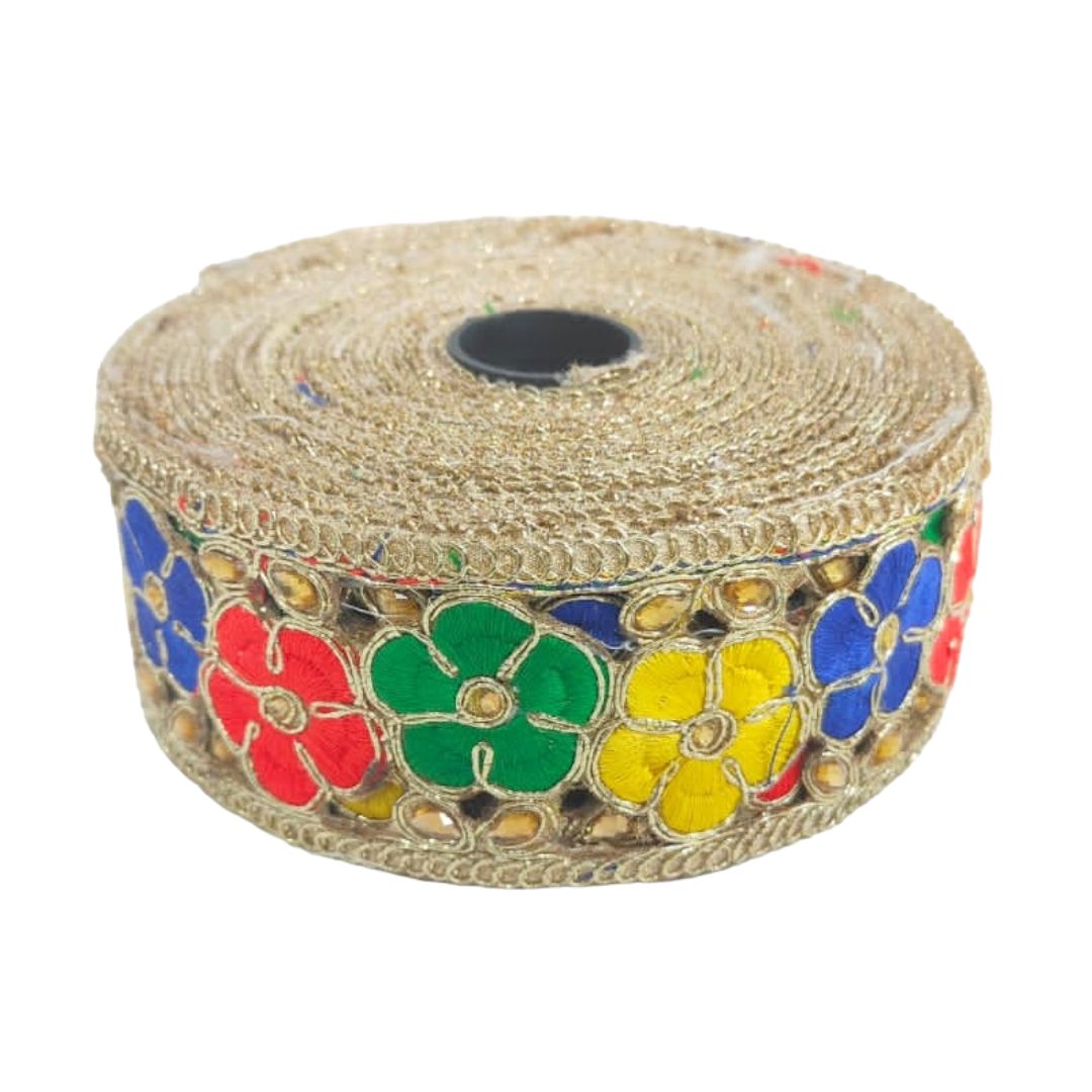 Roll of decorative ribbon with colorful flowers on a white background